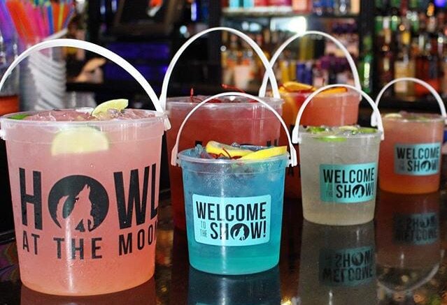 Choices, choices, choices... What will you be drinking tonight?? 🍒🍊🍋🍑 . . #howlatthemoon #bucketdrinks #cocktails #friyay #friday #weekend #vibes #welcometotheshow #wolfpack #drinks