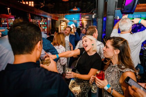 Holiday party group mingling